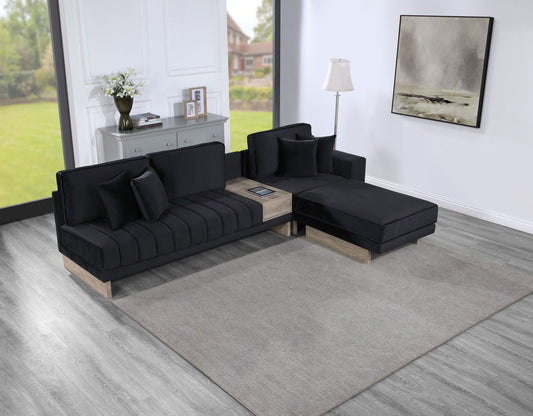 Black leather reversible sectional with storage ottoman, supplier photo