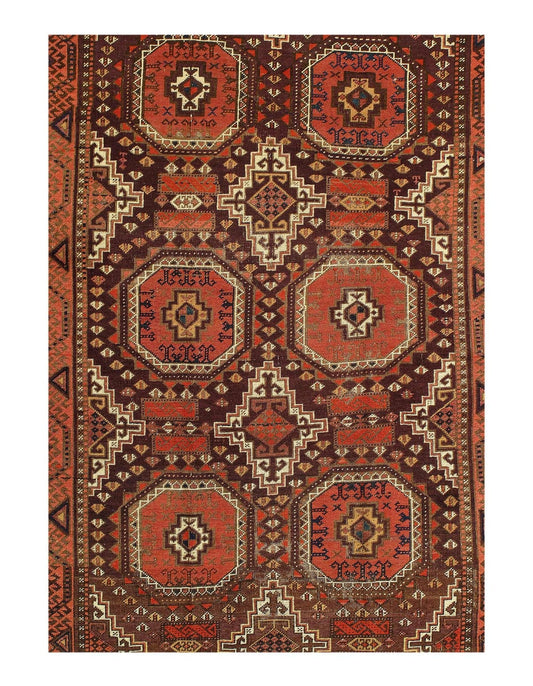 A red and brown hand-knotted vintage rug with geometric patterns, displayed on a white background.