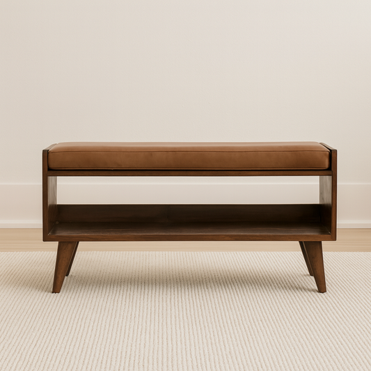 Brown wooden bench with leather seat, placed on carpet against a white backdrop
