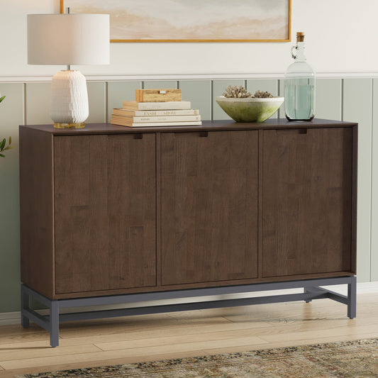 Banting 58 Inch Wide Solid Wood 3 Door Sideboard Buffet with dark wood and metal legs, showcasing decor items on top in a minimalist setting.