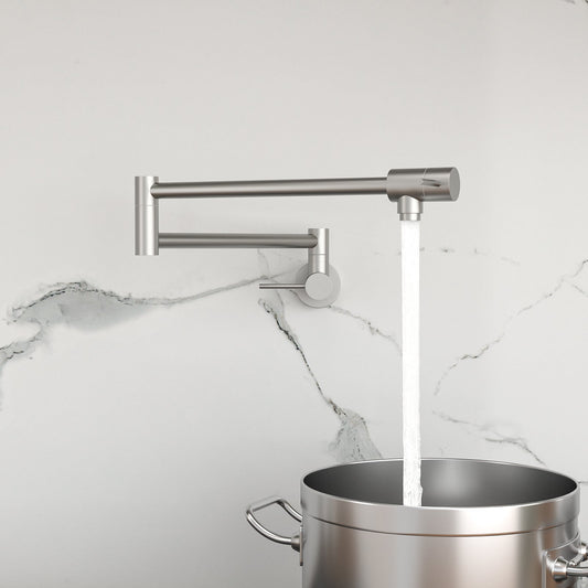 Brass faucet with water flow, stainless steel pot on marble texture
