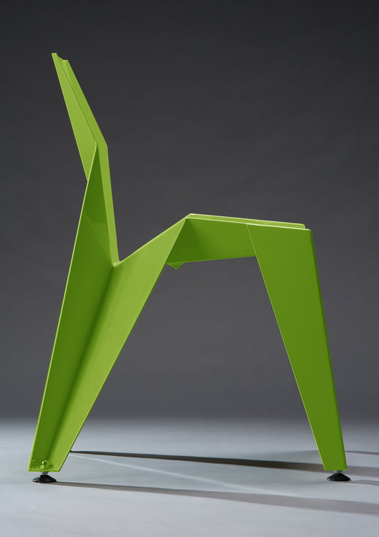 A vibrant neon green chair with a geometric design, placed on a neutral background.