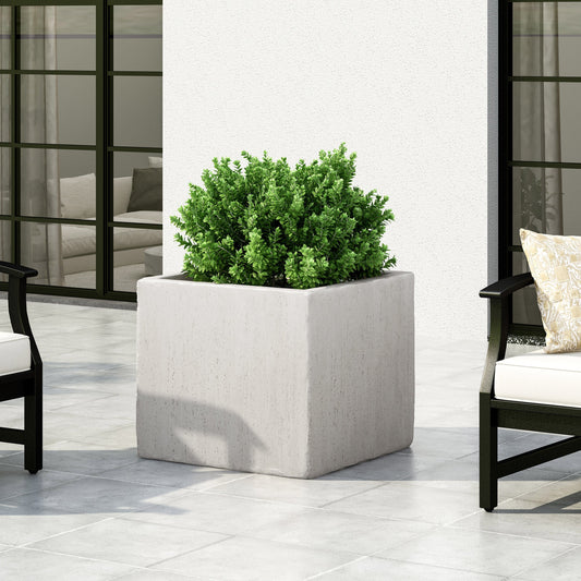 Ella Mgo L 22 Planter Box, textured white ceramic, green plant, tiled patio with black furniture