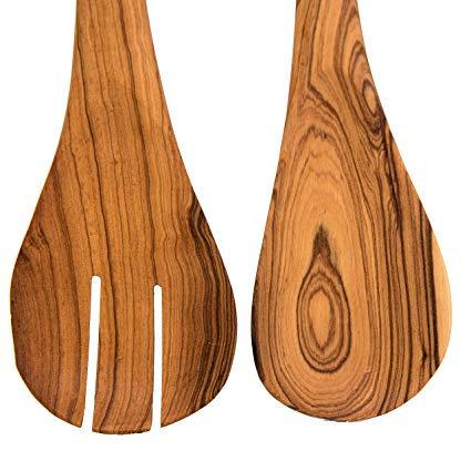 A handcrafted olive wood salad server set with a natural finish and wabi-sabi aesthetic.