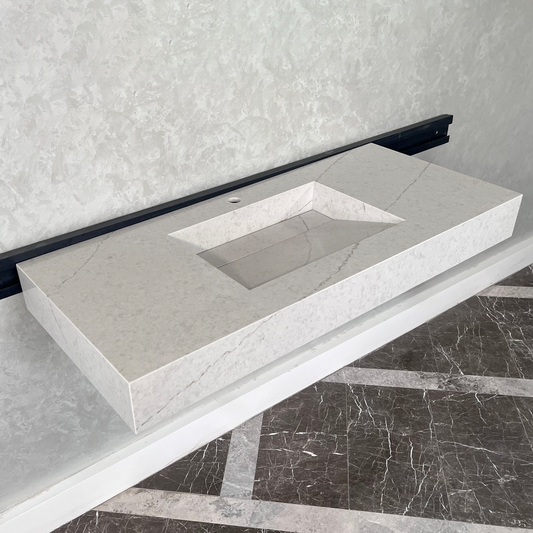 White quartz kitchen sink with subtle natural stone pattern