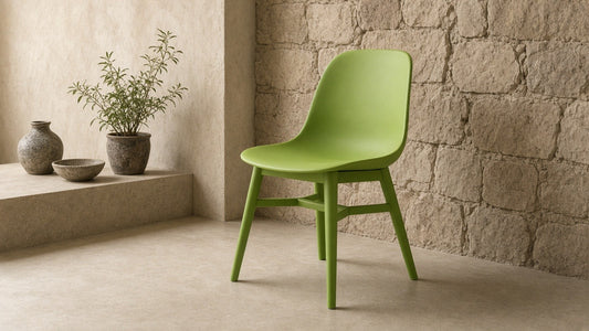 EDGE chair in fresh green in a quiet plaster room