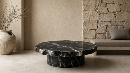 Black agate organic-edge coffee table in a quiet living room