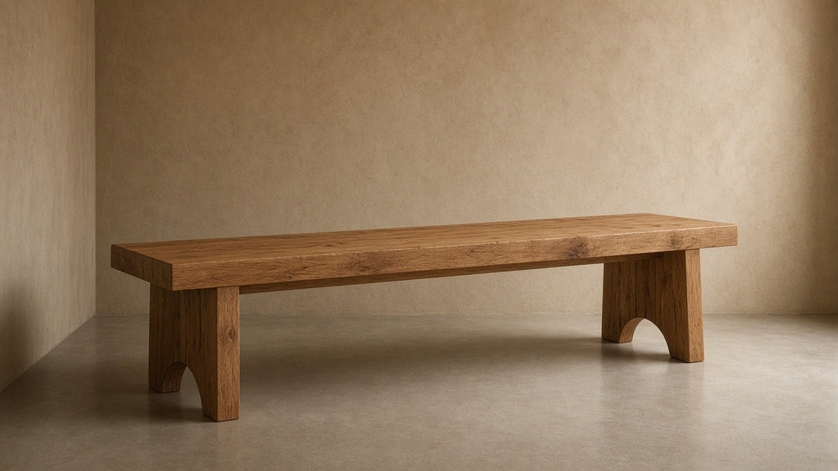 Solid natural mango wood bench 60 inches in empty hall, warm plaster walls, soft daylight