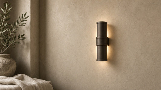Monroe wall sconce on a quiet plaster wall