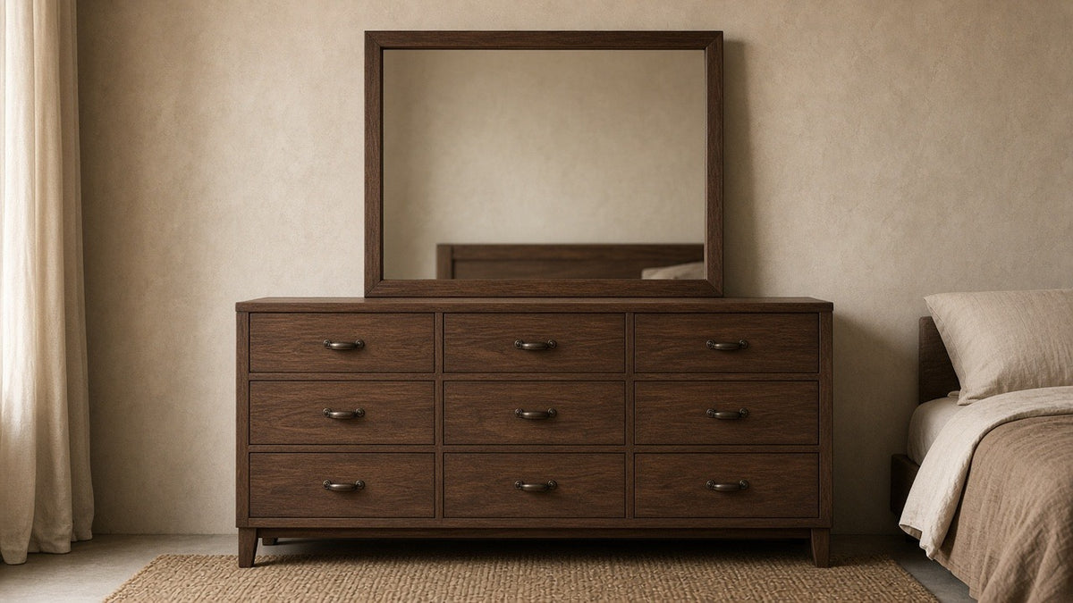 Winslow dresser with mirror in smokey walnut in empty bedroom, warm plaster walls, soft daylight
