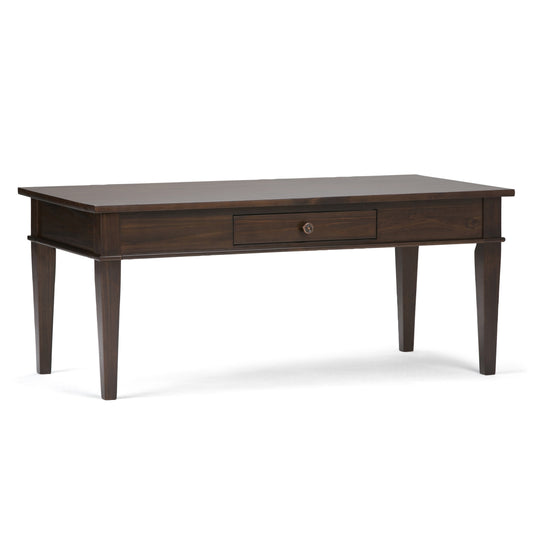 A simple wooden coffee table with a single drawer and four legs.