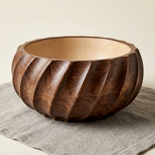 Fluted pink mango wood bowl on a neutral cloth