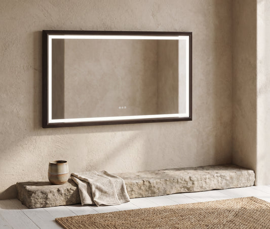 72 x 36 Inch LED Bathroom Mirror with Aluminum Frame; dark brown frame, white frame liner; neutral, textured wall; beige stonework; beige rug & towel