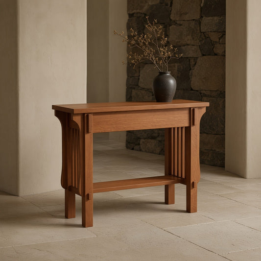 Wooden table with slatted shelves, stone vase with dried branches, beside a stone wall.