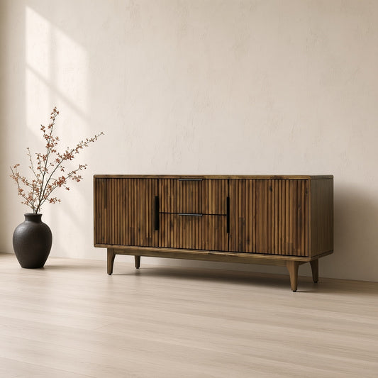 Dark wooden Bosk Wood Fluted TV Stand in a minimalist setting with a vase of red flowers to the left.
