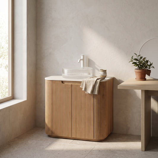 ```json
{ "alt": " wooden bathroom vanity with a white sink, a brown towel, minimal decor, beige walls, natural lighting, setting in a bathroom, shows_product