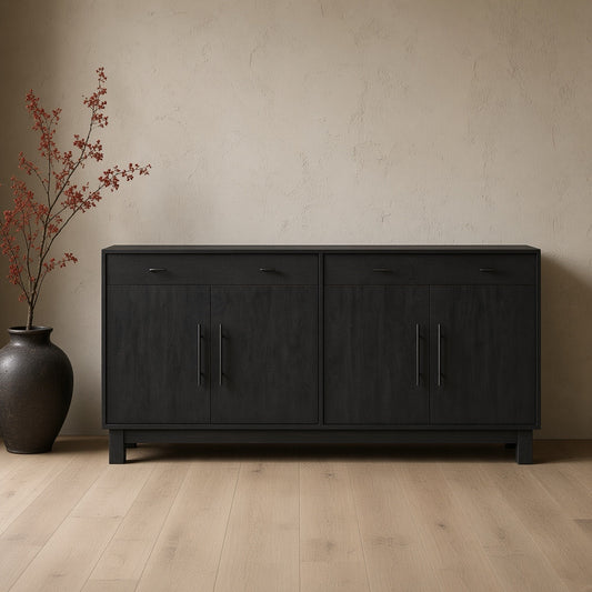 4-door sideboard buffet cabinet in black, likely made of solid wood with a matte finish, placed in a minimalist room with a wooden floor and a vase with red branches to the left.