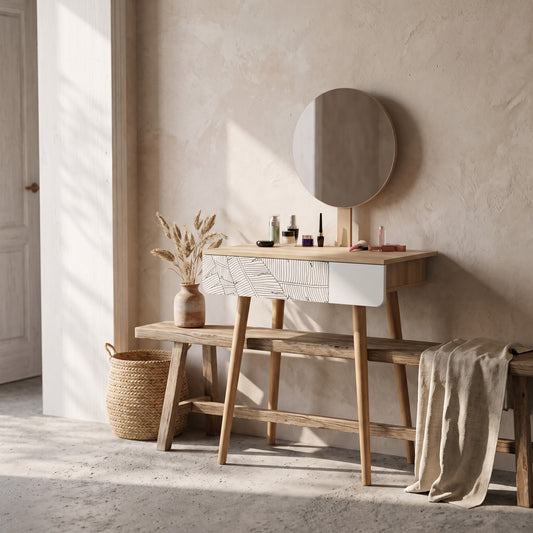 Wooden dressing table with drawer and mirror, oak finish and white detail. Bench nearby. Round mirror above. Decorative items present. Wall textured beige.