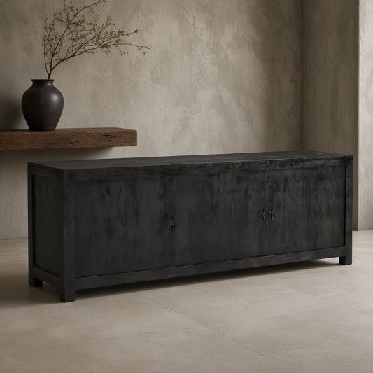 Sparrow Solid Wood 3 Door Media Console - Gray, black finish, in a modern setting with rustic shelf.