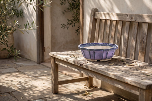 6.5 inch purple ceramic bonsai pot on wooden bench