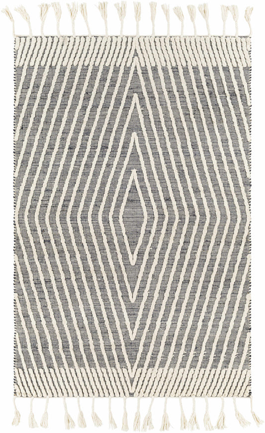 Woven jute and wool rug with diagonal stripes and white tassels, primarily blue with white border, viewed under soft lighting.