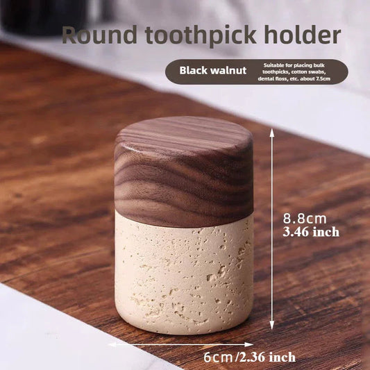 Round toothpick holder with a wooden lid and textured base in beige and dark wood grain, placed on a wooden surface, showing dimensions