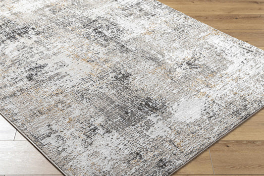 Textured area rug with a mix of white, gray, and gold colors, laid on a light wooden floor.